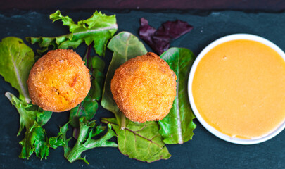 Arancini with sauce