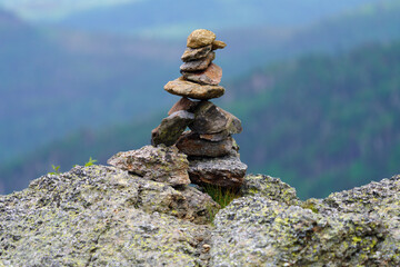 Stacked Rocks On A Cliff