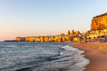 Cefalu, Sicily - Italy - July 7, 2020: Sunset over the medieval old town of Cefalu in Sicily in Italy