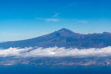 Fototapeta na wymiar Aerial panoramic view on Tenerife island with peak of Mount Teide, volcatic landscape, Canary islands, Spain