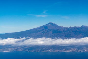 Aerial panoramic view on Tenerife island with peak of Mount Teide, volcatic landscape, Canary islands, Spain