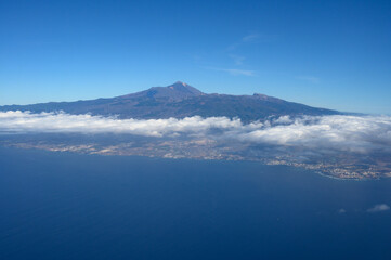 Obraz na płótnie Canvas Aerial panoramic view on Tenerife island with peak of Mount Teide, volcatic landscape, Canary islands, Spain