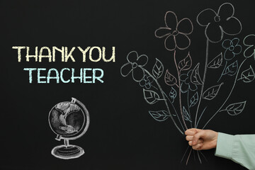 Woman near blackboard with drawn bouquet, globe and phrase Thank You Teacher, closeup