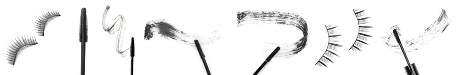 Set of mascara and fake eyelashes on white background