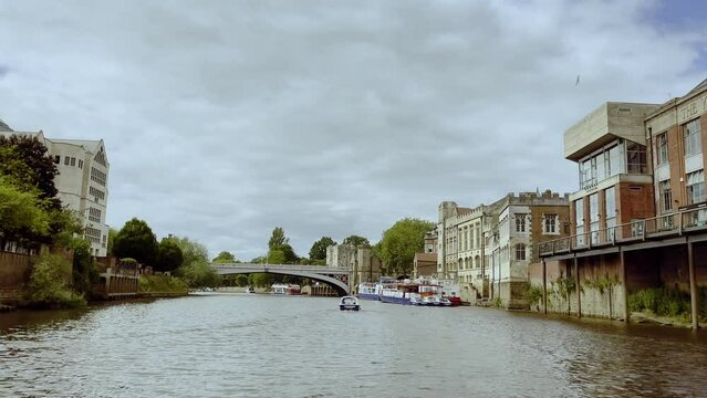 Boat driving along the River Ouse in York, the United Kingdom