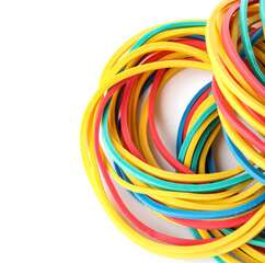 Many colorful rubber bands on white background, closeup