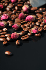 Coffee beans and preserved rose buds for tea drink