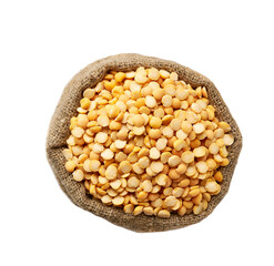 Raw dried peas in sack isolated on white background top view.