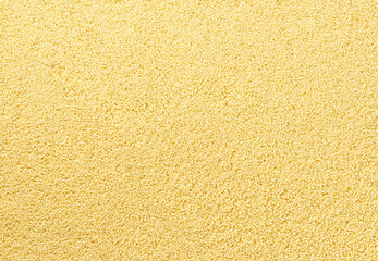 close-up texture of raw couscous top view.