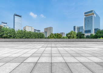 Fototapeta na wymiar empty pavement and modern buildings in city