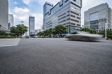 Fototapeta na wymiar empty asphalt road with city skyline background in china