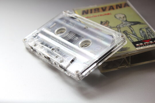 Bangkok, Thailand - 22 January 2022 : Nirvana Album Incesticide's 90s cassette tape on gray background.