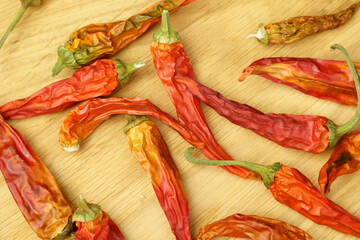 Red dried chilli spice peppers rotate close-up. Selective focus