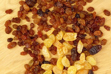 Raisins, close-up. The concept of healthy and organic nutrition. Snacks from dried fruits. Selective focus