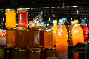 Saranda, Albania Jars of honey for sale in the market.