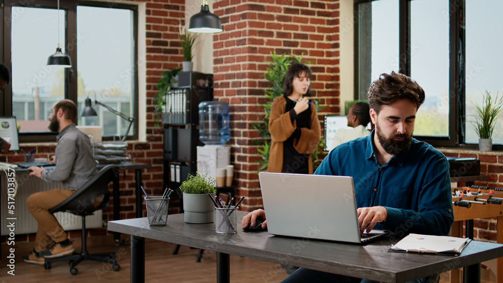 Aufkleber company employee working on business report with laptop, networking research information and data to