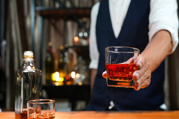 Bartender Serve Whiskey, on wood bar, 