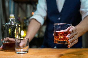 Bartender Serve Whiskey, on wood bar, 