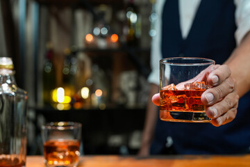 Bartender Serve Whiskey, on wood bar, 