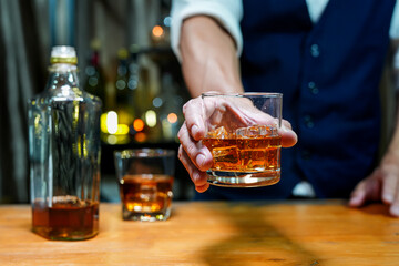 Bartender Serve Whiskey, on wood bar, 
