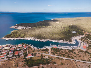 Drone flight over the beautiful island of Pag in Croatia, simuni, novalja, zrece beach - obrazy, fototapety, plakaty