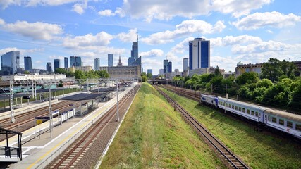 Fototapeta premium A view of the skyscrapers from the footbridge over the railway station.