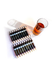 Group of ampoules with a transparent medicine in medical laboratory. lot of ampoules on light background.