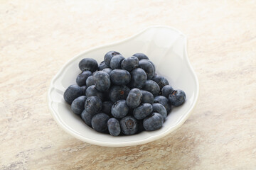 Sweet ripe blueberry heap in the bowl