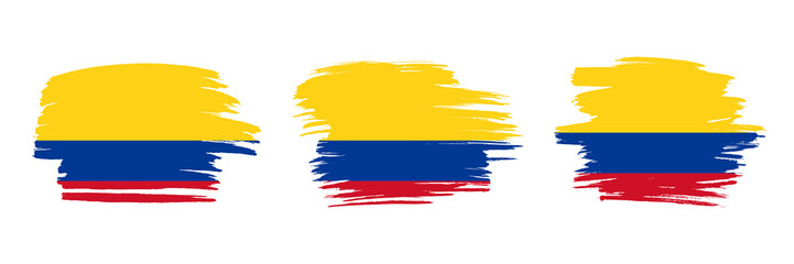 Set of 3 creative brush flag of Colombia with grungy stroke effect. Modern brush flags collection.