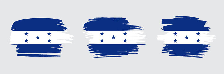 Obraz na płótnie Canvas Set of 3 creative brush flag of Honduras with grungy stroke effect. Modern brush flags collection.