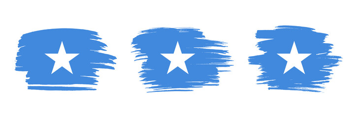 Set of 3 creative brush flag of Somalia with grungy stroke effect. Modern brush flags collection.
