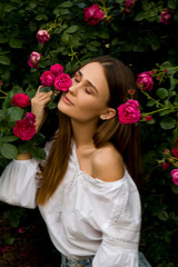 portrait of a girl with a pink rose