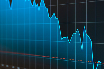 Daily trading prices stock market graph showing on the screen.Daily investor's business everyday life.Selective focus.