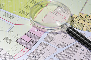 Imaginary cadastral map with buildings, land parcel and vacant plot - property registry and real...