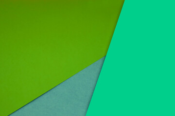 Dark and light, Plain and Textured Shades of sea blue green grey papers background lines intersecting to form a triangle shape