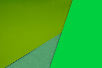 Dark and light, Plain and Textured Shades of yellow green papers background lines intersecting to...
