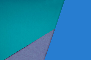Dark and light, Plain and Textured Shades of Blue Sea green grey papers background lines intersecting to form a triangle shape