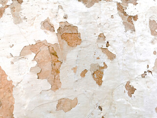 Old cracked paint peeling of concrete wall texture background.