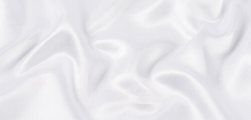 Obraz premium white silk fabric texture background. Cloth soft wave. Creases of satin