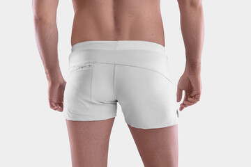 Mockup of white boxers on a man close-up, panties with zipper pocket, back view, isolated on...