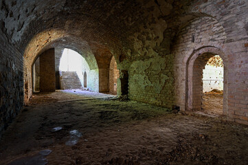 Naklejka premium Protected from shells and bombs, the premises and barracks of an abandoned military fortification. Tarakanovsky fort