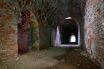 Protected from shells and bombs, the premises and barracks of an abandoned military fortification....