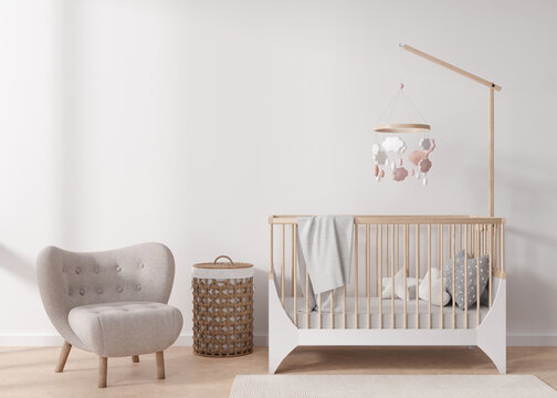 Empty white wall in modern child room. Mock up interior in scandinavian style. Copy space for your picture or poster. Bed, armchair, rattan basket. Cozy room for kids. 3D rendering.