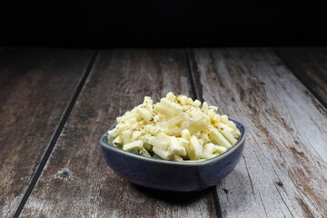 Product of spinach with cheese in the plate. Preparation food in kitchen concept.