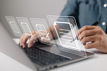 Ideas for a paperless workplace, electronic signatures, and document management. A businessman signs an electronic document that is displayed on the screen of a virtual notebook using a stylus pen.