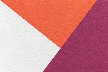 Fototapeta na wymiar Texture of craft white, wine and orange shade color paper background, macro. Vintage abstract purple cardboard