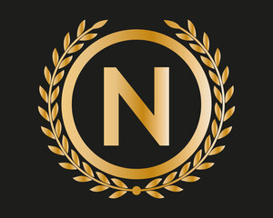 N Gold Letter Design Vector with Golden Luxury Colors and Monogram Design
