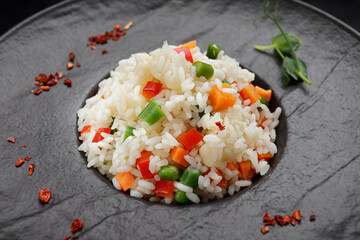 Risotto with vegetables and spices on a plate