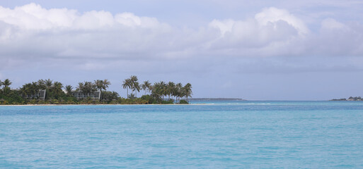 Fototapeta na wymiar Maldives resort island with palm trees