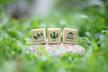ESG on marbled wooden blocks It is an idea for sustainable organizational development. By taking into account 3 main aspects: environment, society and good governance